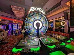 aaajili52 online slot game screen showing reel symbols and bonus feature on a mobile phone